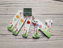 Load image into Gallery viewer, Floral Inital keyring and birth month fobs